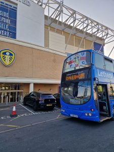Lethers Travel double decker bus outside Elland Road stadium in Leeds